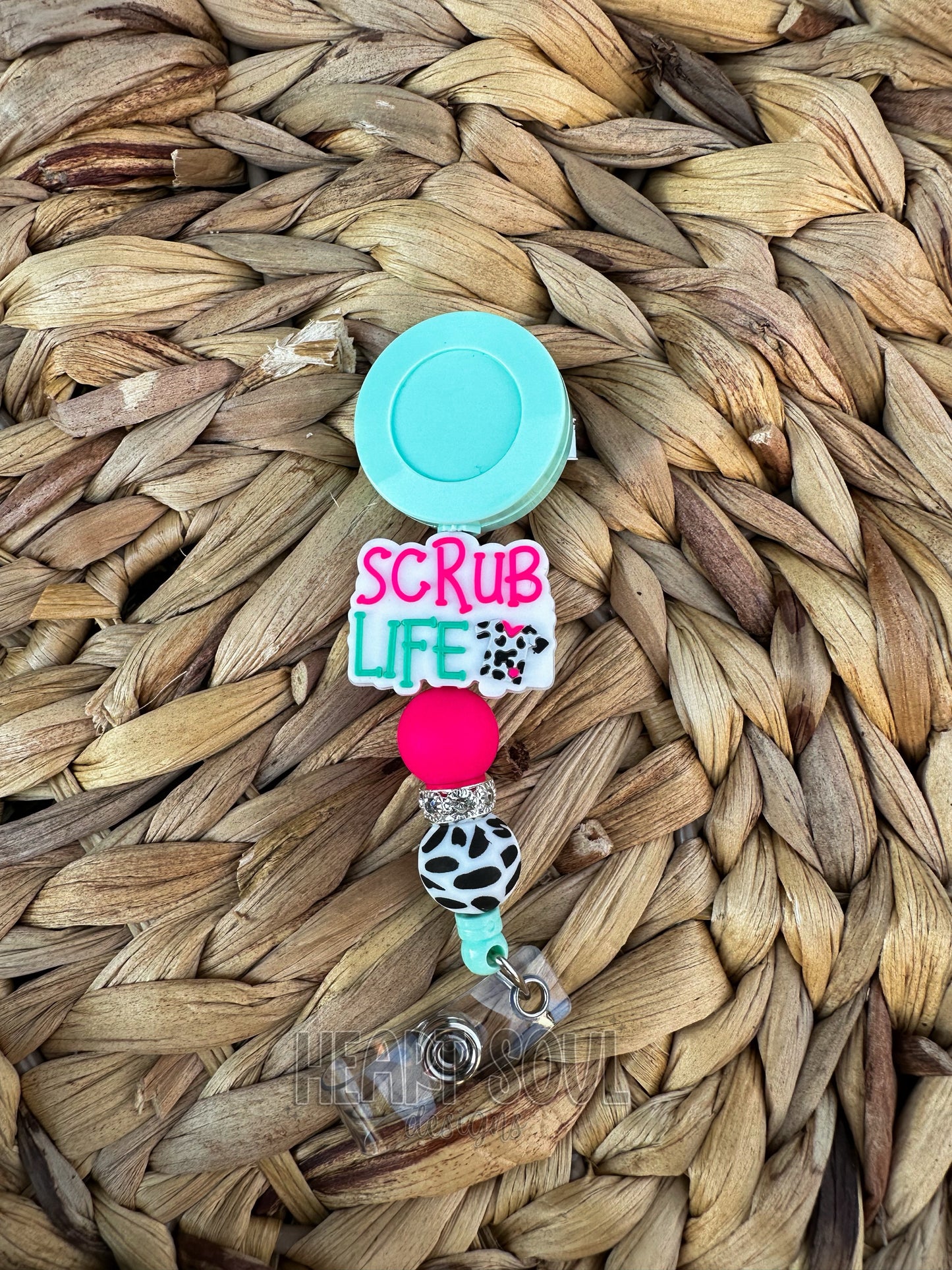 Scrub life cow badge reel