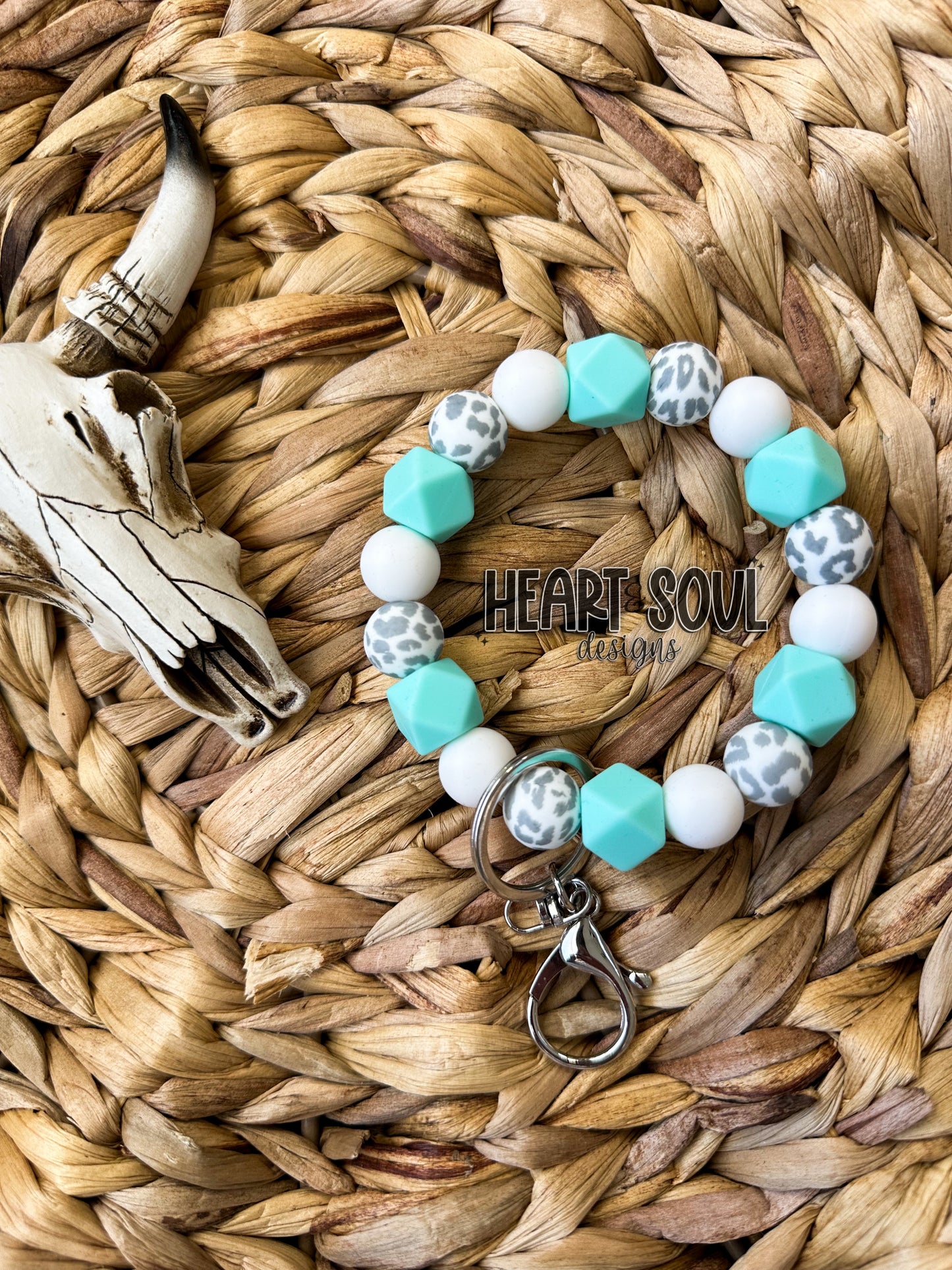 Mint leopard wristlet