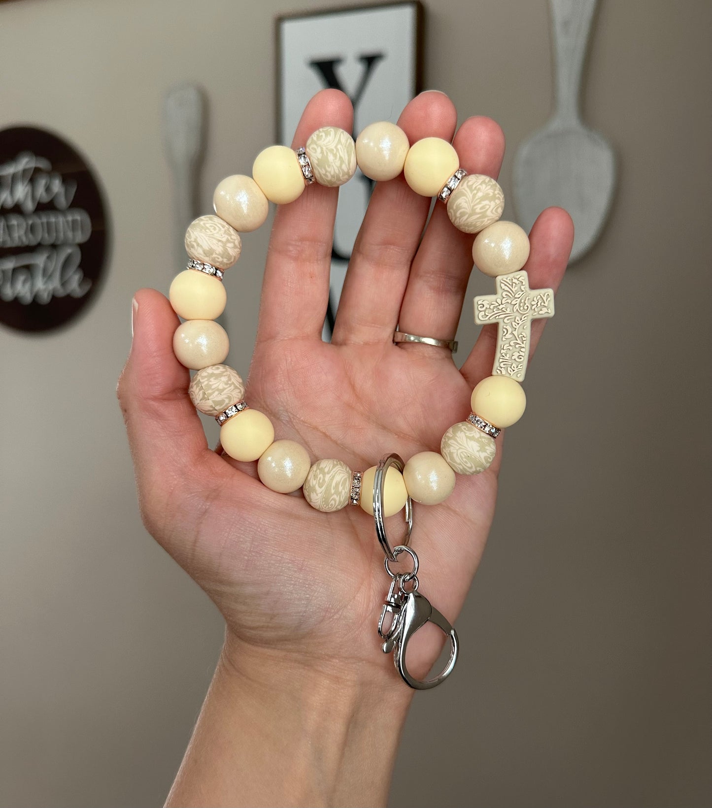 Ivory cross wristlet