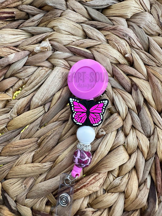 Pink butterfly badge reel