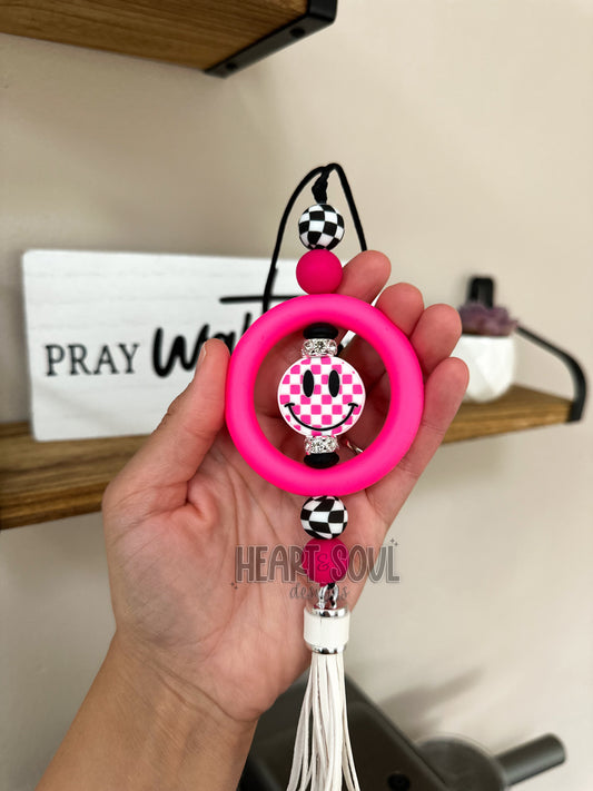 Checkered smiley car charm - hot pink