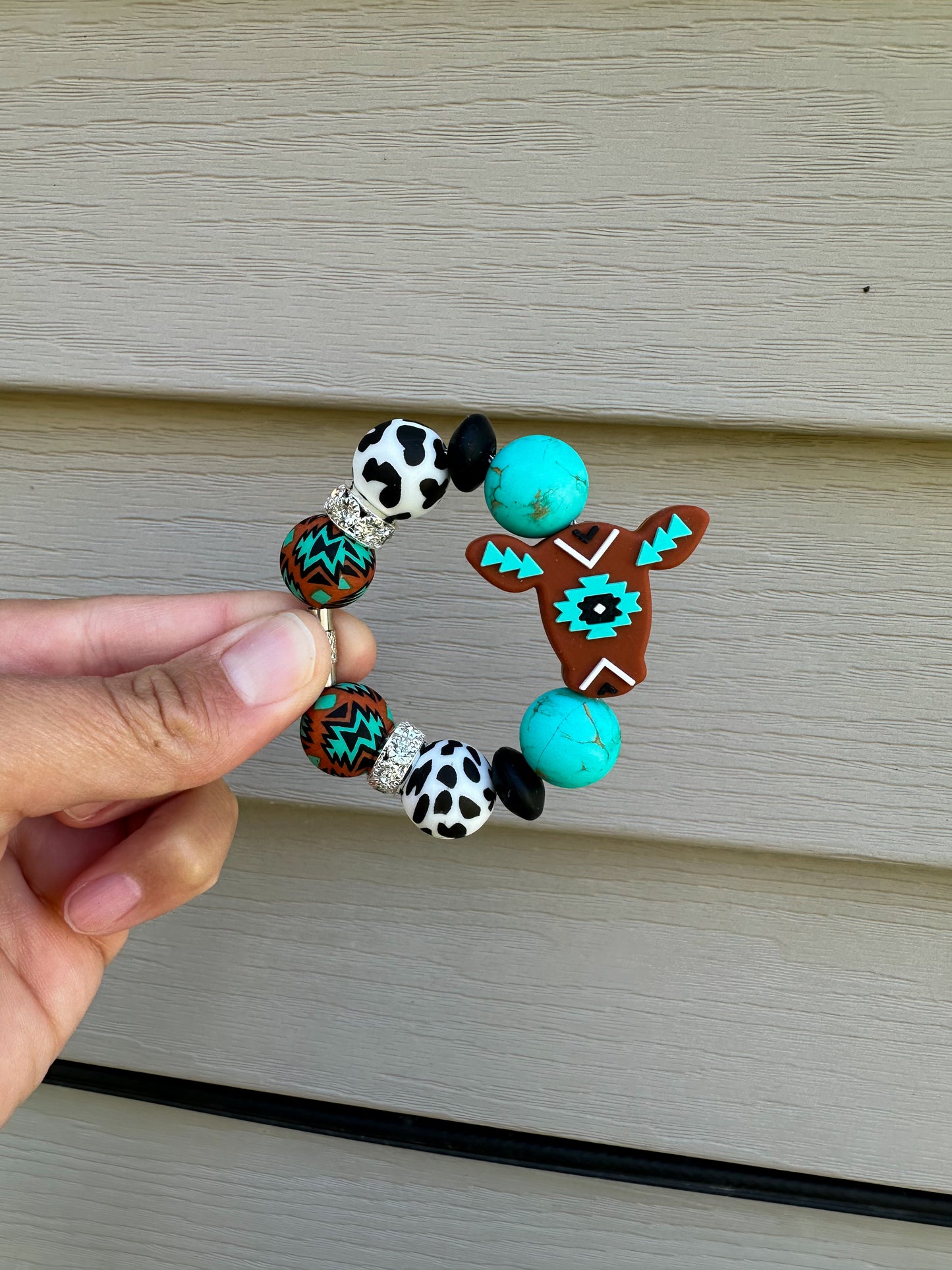 Aztec cow cup charm